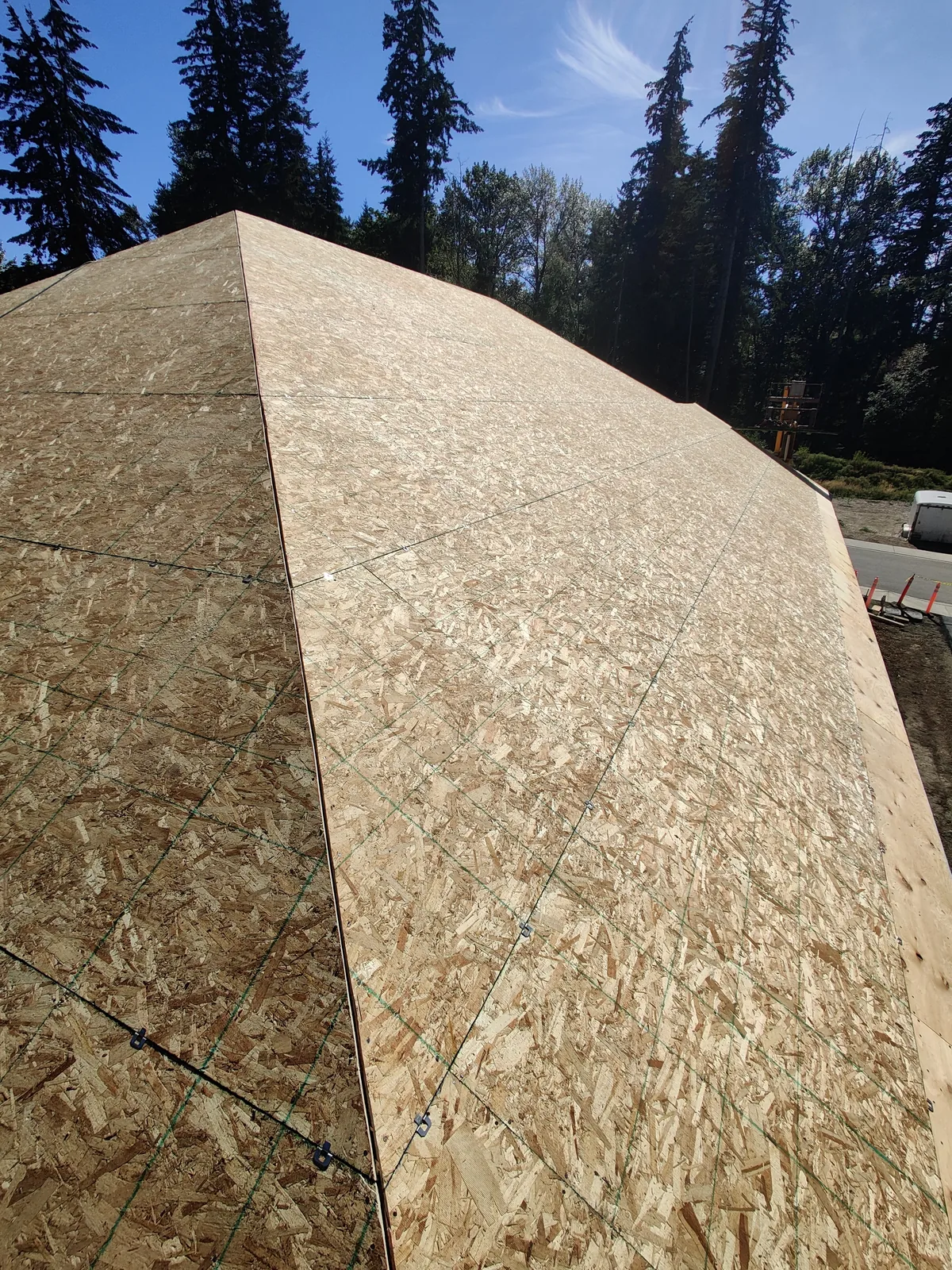 Structural roof sheathing installed on a residential roof framing system